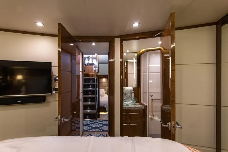 Janie Yacht Photos Pics Luxurious interior of 2018 Sea Ray L650 Fly yacht with elegant wood finishes and modern amenities.