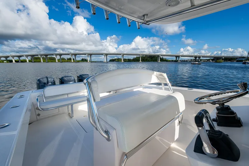 Checkered Flag Yacht Photos Pics 2011 Bahama 37 boat interior with scenic bridge and water view.