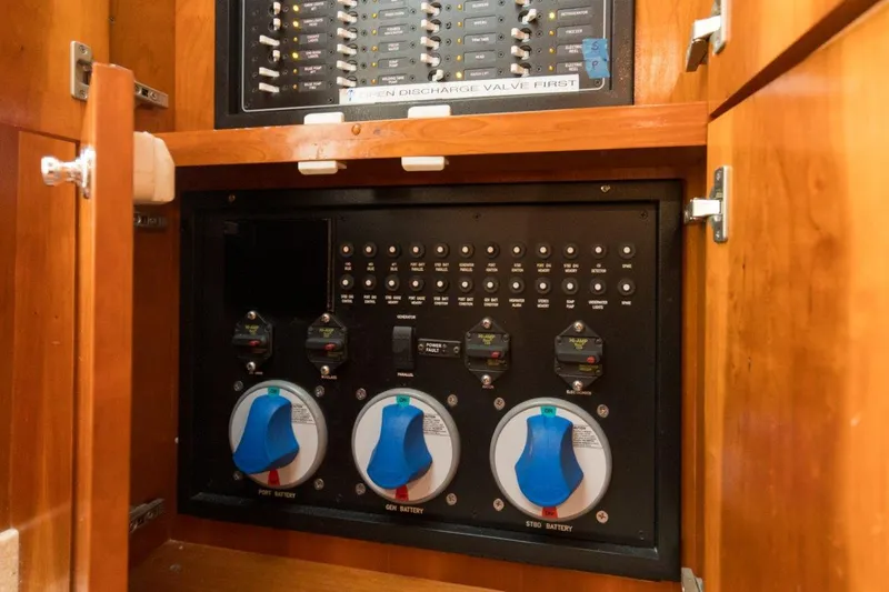 Tin Bender Yacht Photos Pics Electrical control panel inside 2009 Albemarle 360 XF boat, featuring switches and dials.