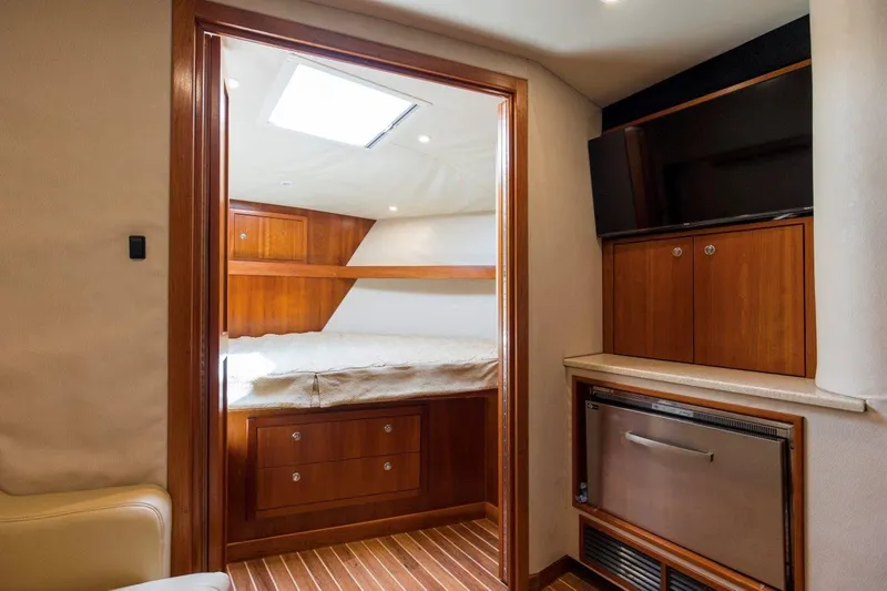 Tin Bender Yacht Photos Pics Interior of 2009 Albemarle 360 XF yacht with wood cabinetry and modern amenities.
