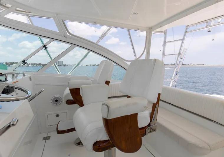 Tin Bender Yacht Photos Pics 2009 Albemarle 360 XF yacht interior with white captain chairs and ocean view.