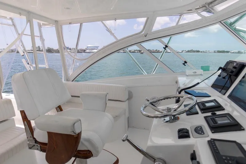 Tin Bender Yacht Photos Pics 2009 Albemarle 360 XF yacht helm with white seating and ocean view.