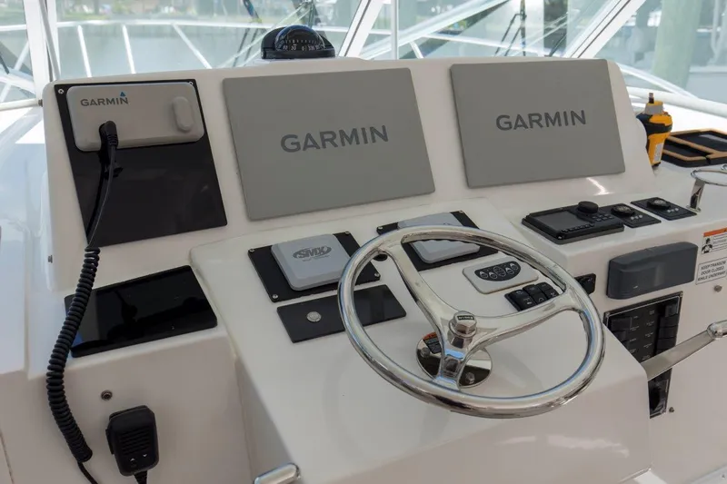 Tin Bender Yacht Photos Pics Control panel of a 2009 Albemarle 360 XF boat with Garmin navigation equipment.