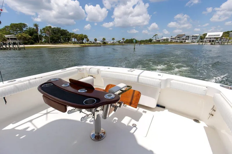 Tin Bender Yacht Photos Pics 2009 Albemarle 360 XF boat deck with fishing chair, scenic waterfront view.