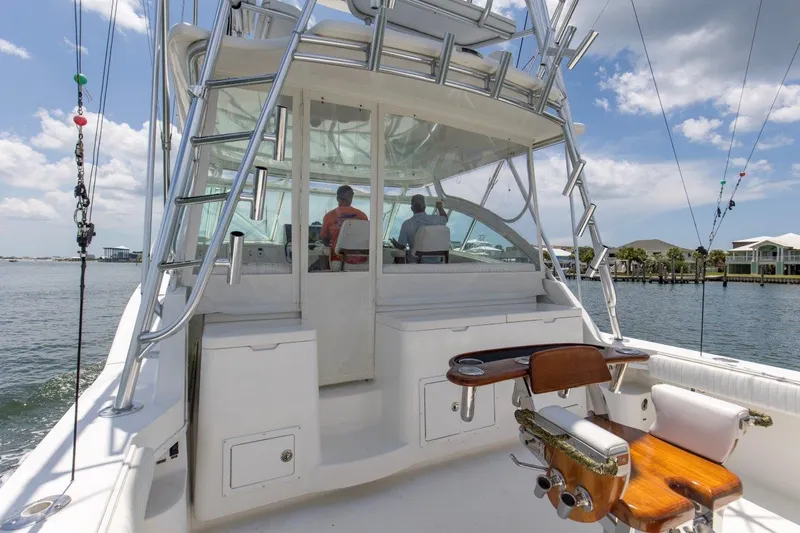 Tin Bender Yacht Photos Pics 2009 Albemarle 360 XF boat with fishing gear, cruising on a sunny day.