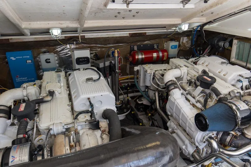 Tin Bender Yacht Photos Pics Engine room of 2009 Albemarle 360 XF boat, featuring dual engines and equipment.