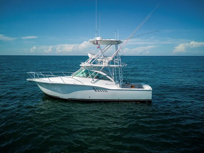 Tin Bender Yacht Photos Pics 2009 Albemarle 360 XF boat on open sea under clear blue sky.