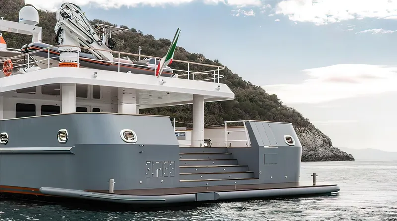 Explorer 130 Yacht Photos Pics Luxury yacht Ocean King Explorer 130, 2027 model, docked near scenic coastline.