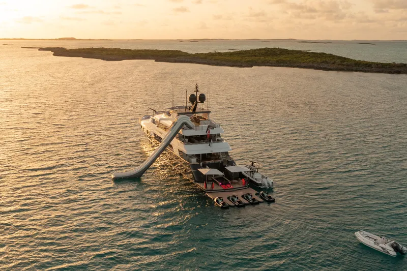 No Bad Ideas Yacht Photos Pics Luxurious 2000 Trinity Yachts Trinity 160 with slide, anchored at sunset.