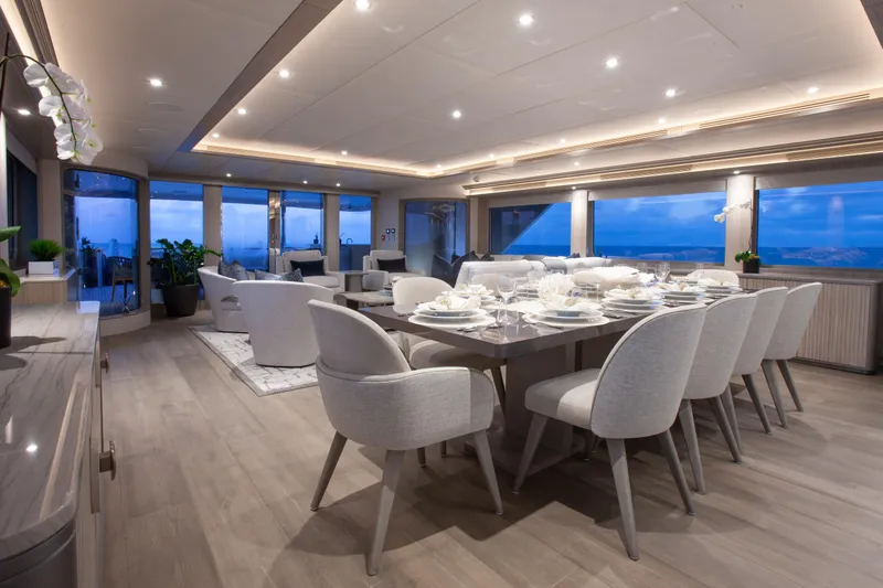 No Bad Ideas Yacht Photos Pics Luxurious dining area on 2000 Trinity Yachts Trinity 160, featuring elegant decor and ocean views.