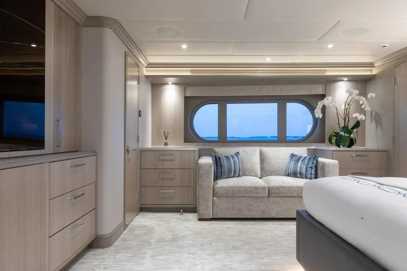 No Bad Ideas Yacht Photos Pics Luxurious interior of 2000 Trinity Yachts Trinity 160, featuring elegant furnishings and ocean view.