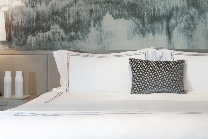 No Bad Ideas Yacht Photos Pics Luxurious yacht bedroom with elegant bedding and modern decor, Trinity Yachts Trinity 160, 2000.