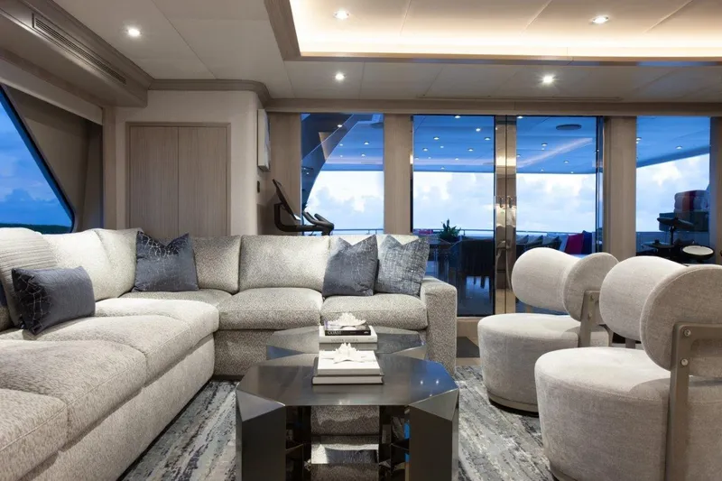 No Bad Ideas Yacht Photos Pics Luxurious interior of 2000 Trinity Yachts Trinity 160 with modern seating and ocean view.