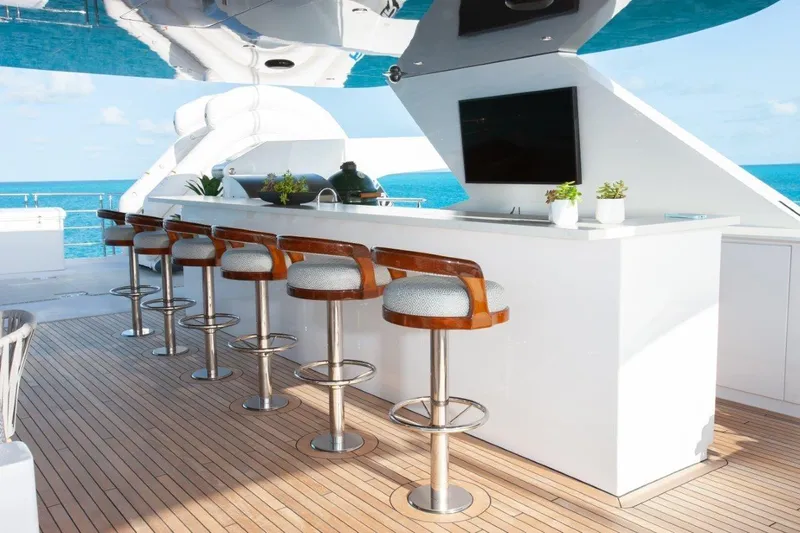 No Bad Ideas Yacht Photos Pics Luxurious outdoor bar on Trinity Yachts Trinity 160, 2000 model, with ocean view.