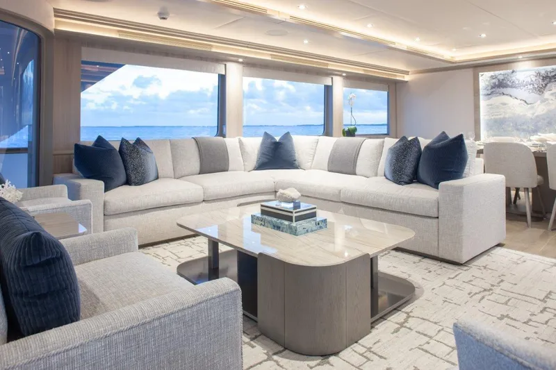 No Bad Ideas Yacht Photos Pics Luxurious interior of 2000 Trinity Yachts Trinity 160 with elegant seating and ocean view.