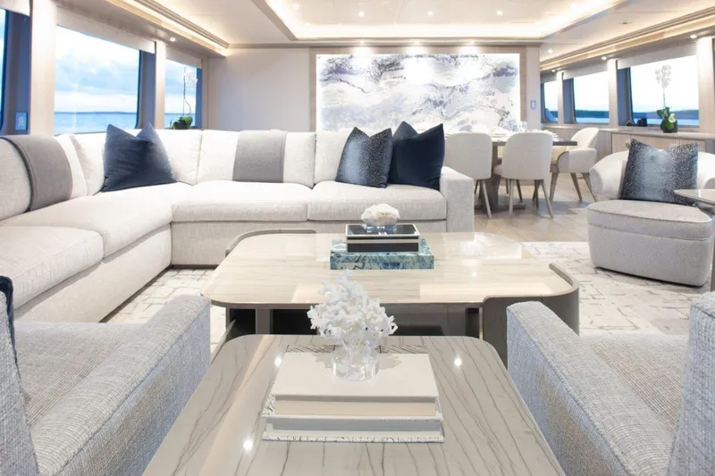 No Bad Ideas Yacht Photos Pics Luxurious interior of 2000 Trinity Yachts Trinity 160, featuring elegant seating and modern decor.
