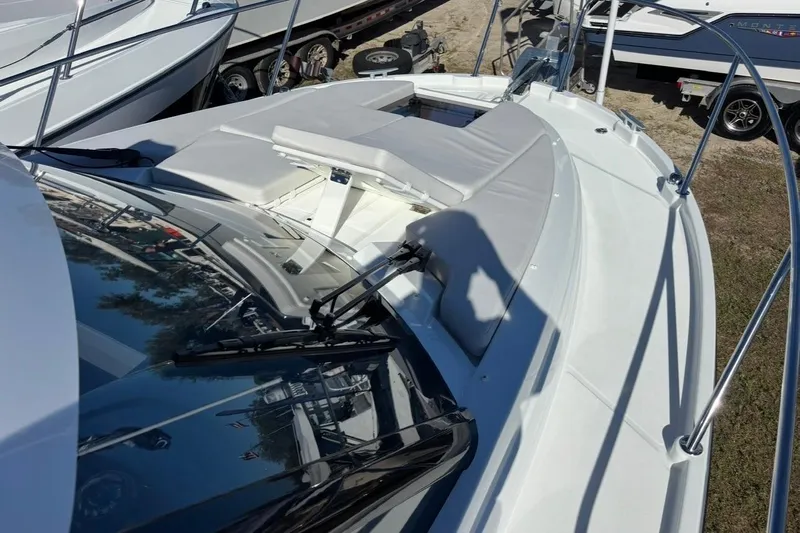  Yacht Photos Pics 2026 Beneteau Antares 9 V2 boat deck with seating and windshield wipers.