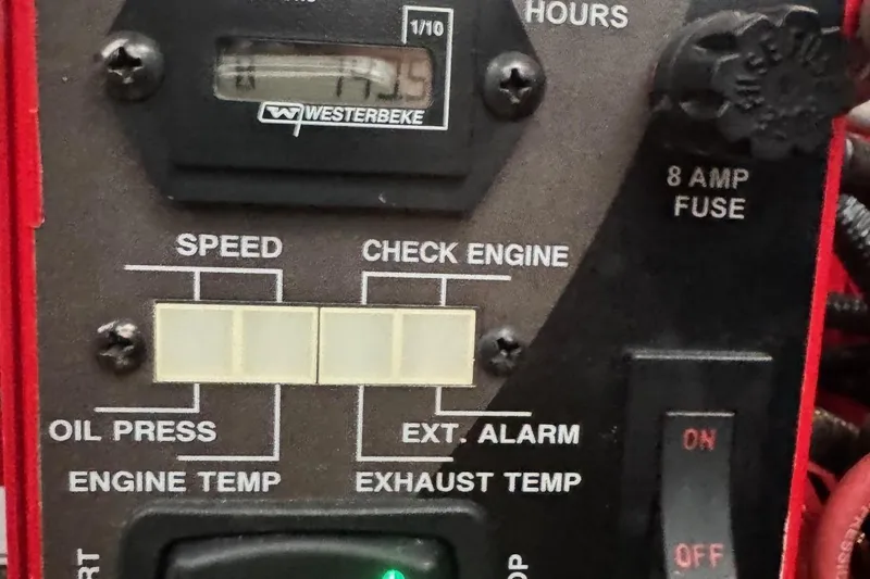  Yacht Photos Pics Control panel of a 2018 Regal 35 Sport Coupe with engine indicators and switches.