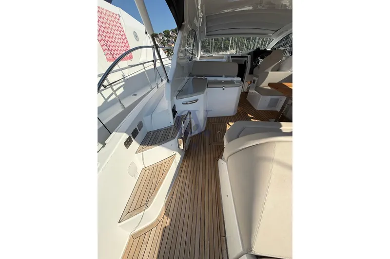 M Yacht Photos Pics 2019 Azimut Atlantis 45 yacht interior with wooden flooring and seating area.
