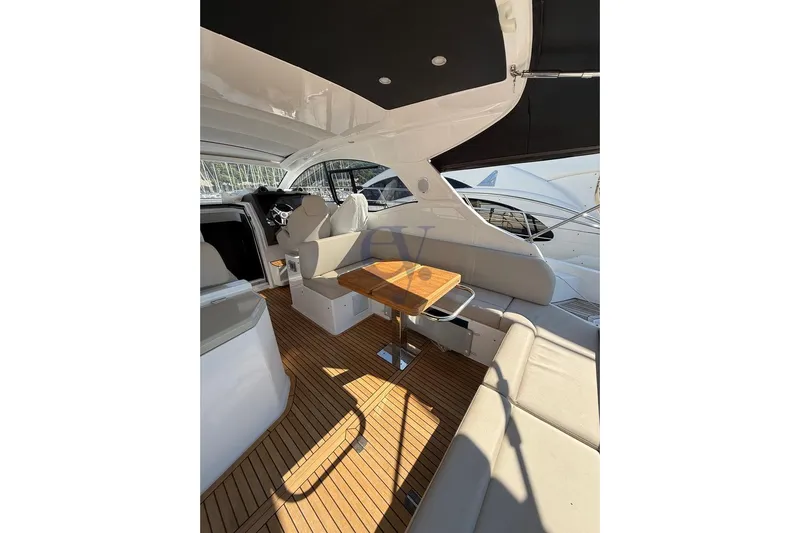 M Yacht Photos Pics Luxurious interior of 2019 Azimut Atlantis 45 yacht with elegant seating and wooden flooring.