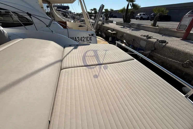 M Yacht Photos Pics 2019 Azimut Atlantis 45 yacht with beige sunbed, docked at marina.