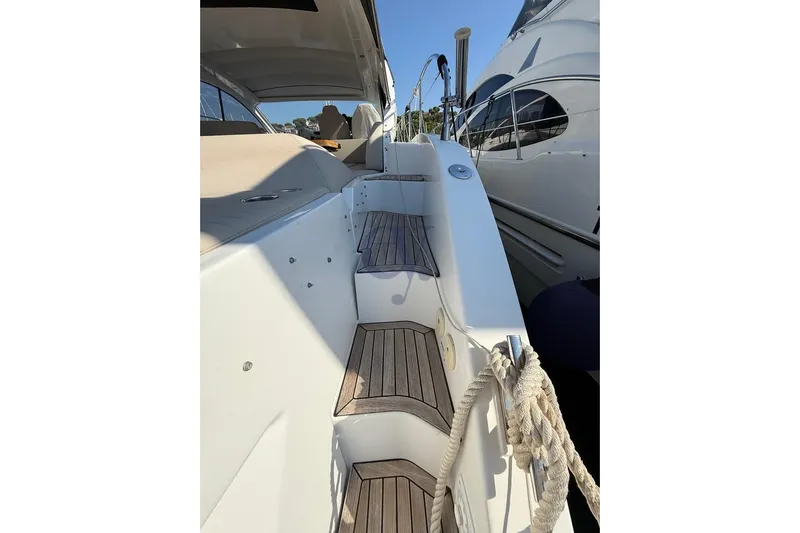 M Yacht Photos Pics Azimut Atlantis 45 yacht, 2019 model, featuring sleek deck design and wooden steps.