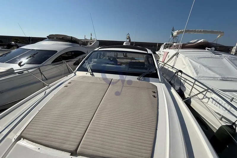 M Yacht Photos Pics 2019 Azimut Atlantis 45 yacht docked among other boats under clear sky.