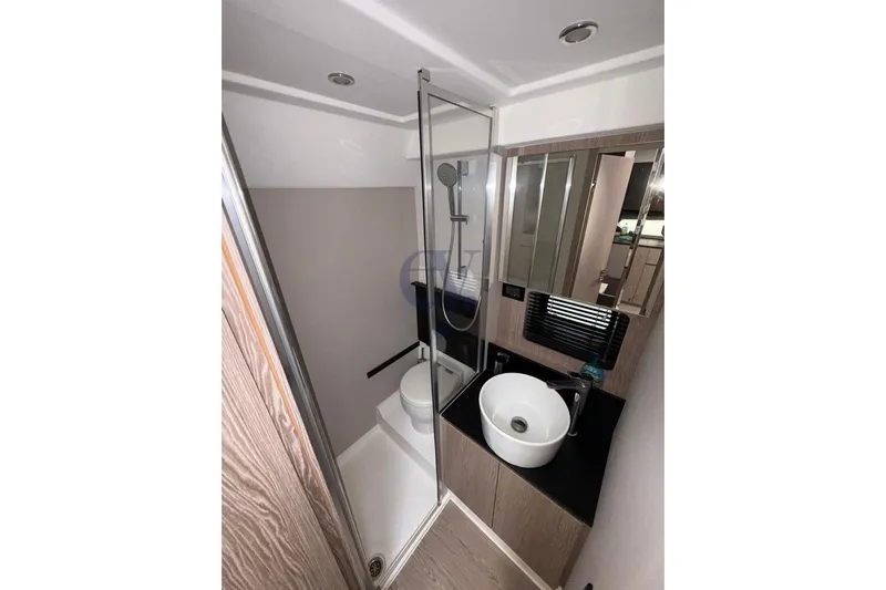 M Yacht Photos Pics Modern bathroom in 2019 Azimut Atlantis 45 yacht with sleek fixtures and shower.