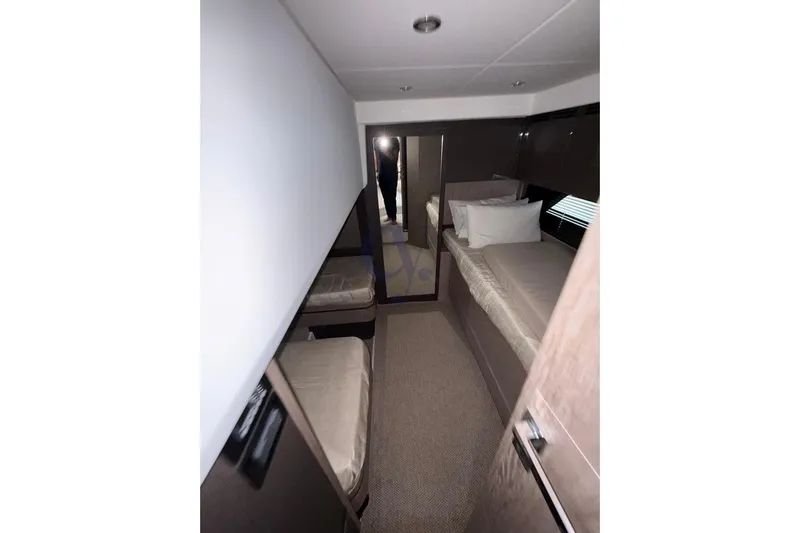 M Yacht Photos Pics Interior cabin of 2019 Azimut Atlantis 45 yacht with twin beds and modern decor.