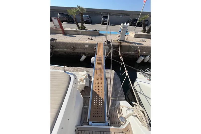 M Yacht Photos Pics Boarding ramp on 2019 Azimut Atlantis 45 yacht docked at marina.