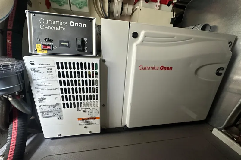  Yacht Photos Pics Cummins Onan generator inside 2013 Prestige 500 S yacht engine room.