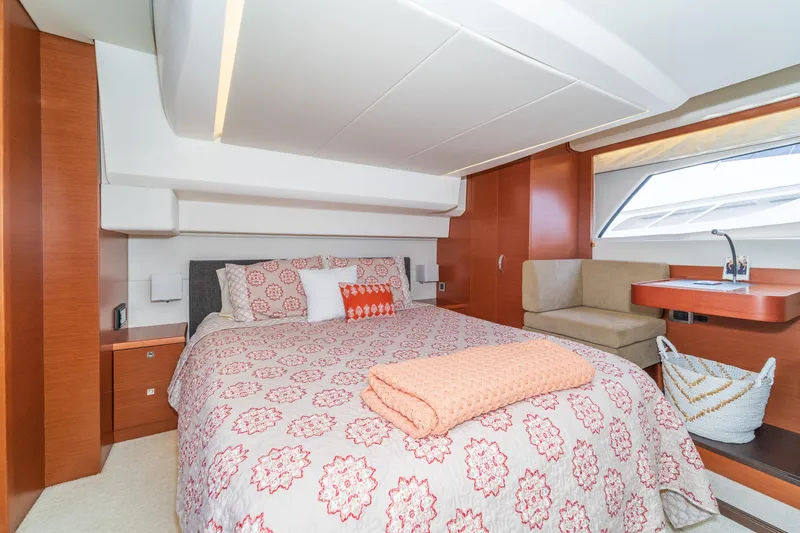  Yacht Photos Pics Luxurious bedroom interior of 2013 Prestige 500 S yacht with elegant bedding and modern design.