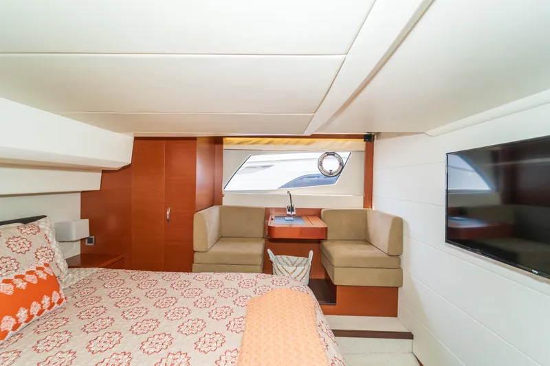  Yacht Photos Pics Luxurious interior of 2013 Prestige 500 S yacht with cozy seating and elegant decor.