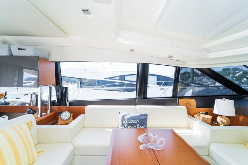  Yacht Photos Pics Luxurious interior of 2013 Prestige 500 S yacht with elegant seating and decor.