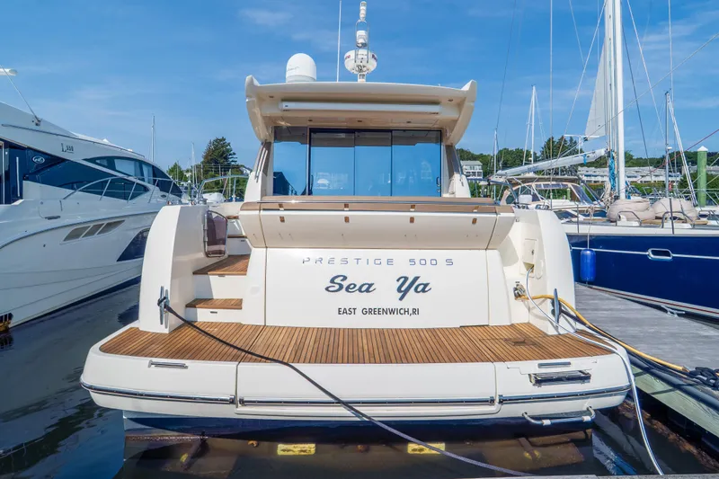  Yacht Photos Pics 2013 Prestige 500 S yacht docked, rear view, with "Sea Ya" name, East Greenwich, RI.