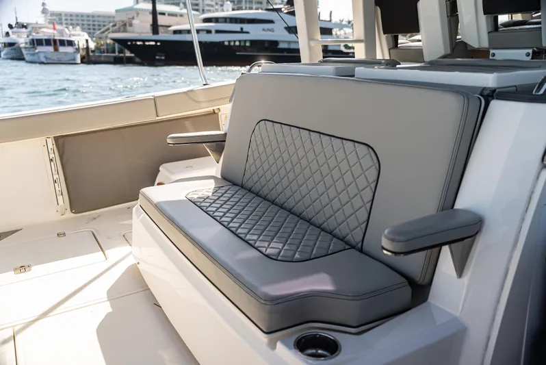  Yacht Photos Pics Luxury seating on a 2021 Pursuit 428 boat, featuring diamond-stitched upholstery.