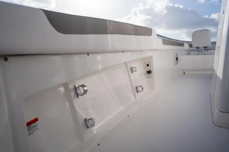  Yacht Photos Pics 2025 Caymas 291 HB boat interior with sleek white design and modern fittings.