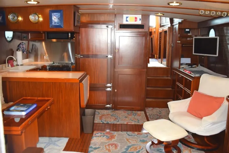 Qa3 Yacht Photos Pics Salon area and galley, Note teak ceiling battens throughout interior.