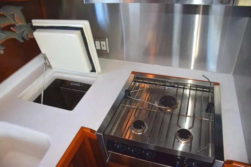 Qa3 Yacht Photos Pics Top load counter cold plate freezer, gas range, teak spill railings