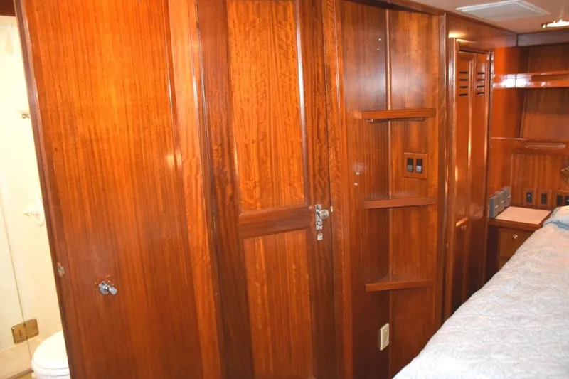 Qa3 Yacht Photos Pics With MSR cabin door closed, shelves for display, storage closet to starboard (beneath stairway), entrance to head to portside