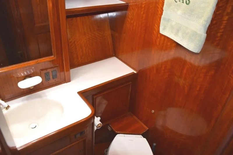 Qa3 Yacht Photos Pics Guest head also has second door from companionway. Molded vanity top and new freshwater head