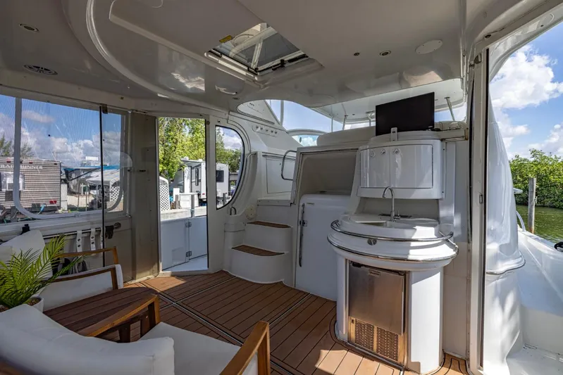 Paradise Yacht Photos Pics Luxurious interior of 2002 Carver 466 Motor Yacht with modern amenities and elegant design.