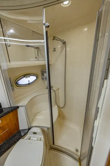 Paradise Yacht Photos Pics Bathroom interior of 2002 Carver 466 Motor Yacht with shower and toilet.