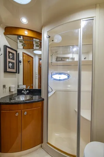 Paradise Yacht Photos Pics Luxurious bathroom in 2002 Carver 466 Motor Yacht with shower and sink.