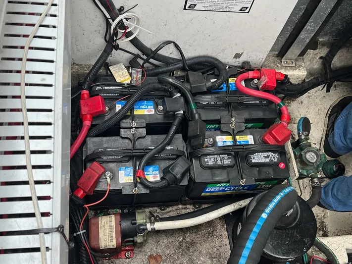 Vitamin Sea Yacht Photos Pics Battery compartment of a 2010 Sea Ray 330 Sundancer with multiple deep cycle batteries.