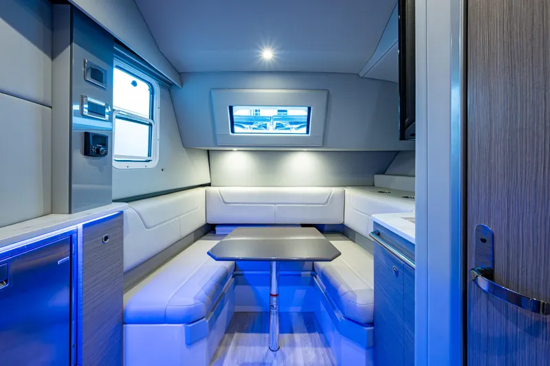  Yacht Photos Pics 2022 Formula 380 Super Sport Crossover OB interior with modern seating and ambient lighting.