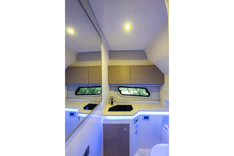  Yacht Photos Pics Interior of 2022 Formula 380 Super Sport Crossover OB, featuring modern cabinetry and lighting.