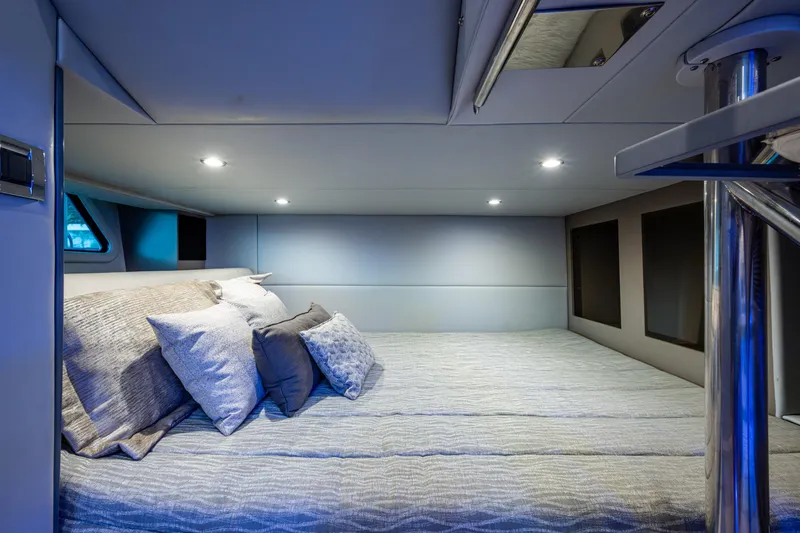 Yacht Photos Pics Luxurious cabin interior of 2022 Formula 380 Super Sport Crossover OB with plush bedding.