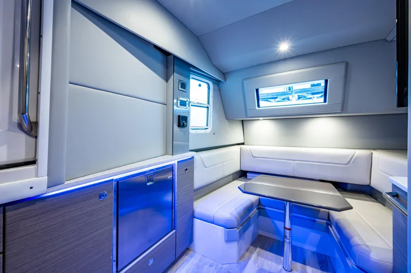  Yacht Photos Pics Luxurious interior of 2022 Formula 380 Super Sport Crossover OB boat with modern seating.