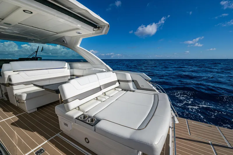  Yacht Photos Pics 2022 Formula 380 Super Sport Crossover OB yacht with luxurious seating on open sea.